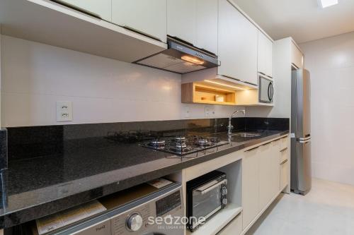 Dapur atau dapur kecil di Sua estadia completa a 800m da Praia em Floripa - CLG