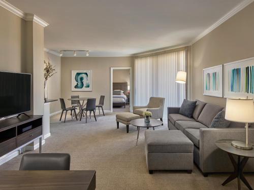 a living room with a couch and a tv at AVE Union - Furnished Apartment, Union NJ in Union