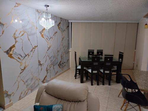 Φωτογραφία από το άλμπουμ του Apartamento full equipado en Lechería σε El Morro de Barcelona