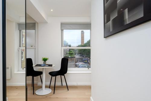 Μια τηλεόραση ή/και κέντρο ψυχαγωγίας στο GuestReady - Greenwich Park Studios