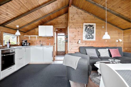 a kitchen and living room of a tiny house at N300-Karrebaeksminde-Poulsvej-104-C in Karrebæksminde