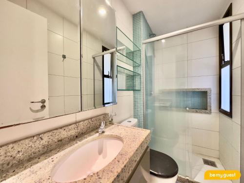 a bathroom with a sink and a mirror at Mandara Lanai Resort - Porto das Dunas in Aquiraz