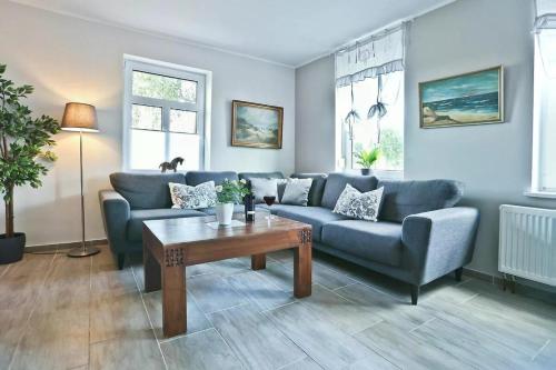 Posezení v ubytování Wohnung Auszeit im Gutshof zum See