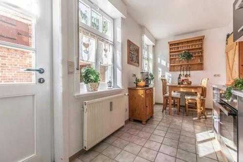Kuchyň nebo kuchyňský kout v ubytování Wohnung Auszeit im Gutshof zum See