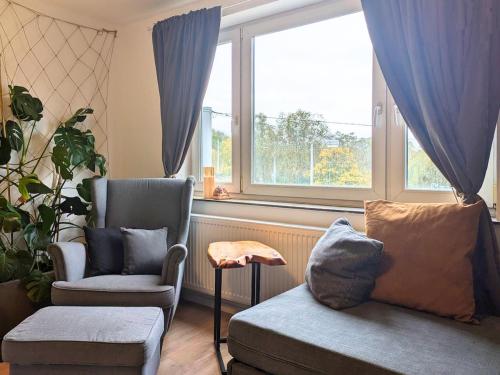Гостиная зона в CityPark Apartment - modernes Zuhause für 4