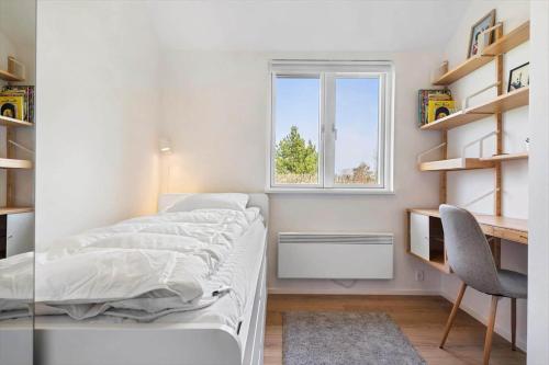 Postel nebo postele na pokoji v ubytování N328-Karrebaeksminde-Reedtzholmvej-35-A