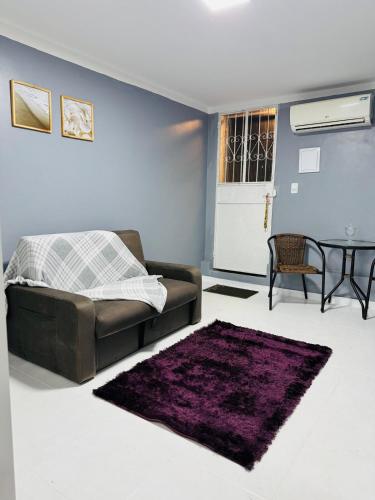 Un lugar para sentarse en Loft manaus Santorini
