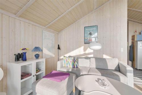 a living room with a couch and a table at N253-Karrebaeksminde-Lundegardsvej-7 in Karrebæksminde