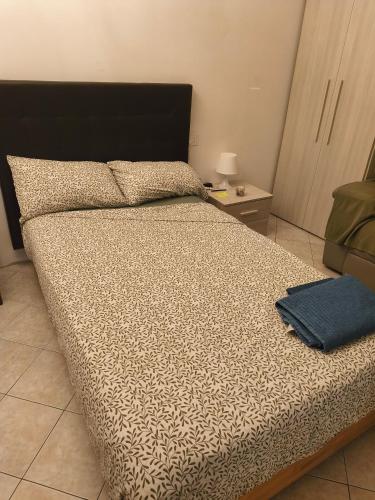 Ένα ή περισσότερα κρεβάτια σε δωμάτιο στο Humanitas, IEO, Forum Assago, Rozzano