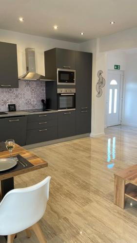 Kuchyň nebo kuchyňský kout v ubytování Apartment Julia