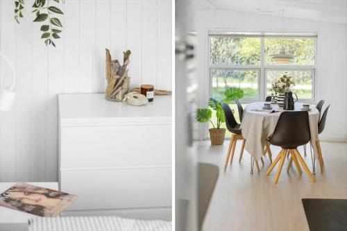 a kitchen and dining room with a table and chairs at JB323-Fjerritslev-Markstien-21 in Torup Strand