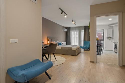 a living room with a couch and a table at Studio 6 in Bucharest