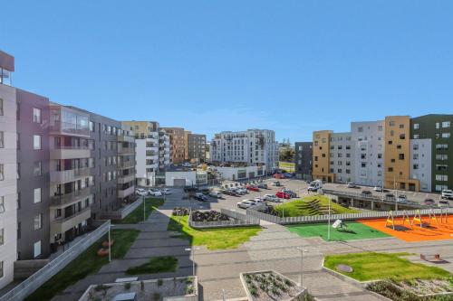 an aerial view of a city with tall buildings at Spacious 2BR Apt with Balcony, Sauna and Free Parking in Reykjavík