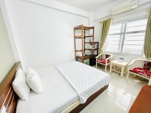 Кровать или кровати в номере The Light Hostel
