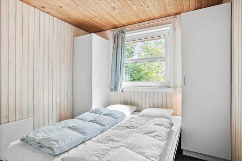 Katil atau katil-katil dalam bilik di JB305-Fjerritslev-Tyttebaerstien-18