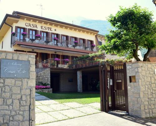 a building with a gate in front of it at Albergo Casa Este in Brenzone sul Garda