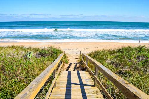 a wooden path leading to a beach with the ocean at Chateau La Mer 1D in Destin
