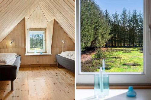 a room with a bed and a window in a house at JB186-Fjerritslev-Gyvelstien-27 in Torup Strand
