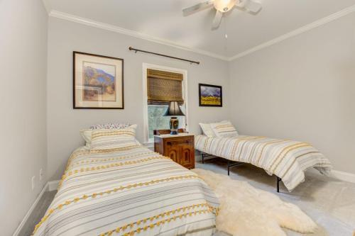 a bedroom with two beds and a window at The Winchester House - Serene Surroundings + Close to Downtown Jasper in West Brook