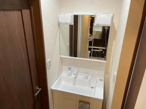 Koupelna v ubytování シーサイドサーフandサウナ九十九里