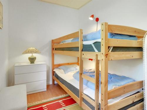 a bunk bed room with two bunk beds at Holiday Home Slavjanka - 2km from the sea by Interhome in Stege