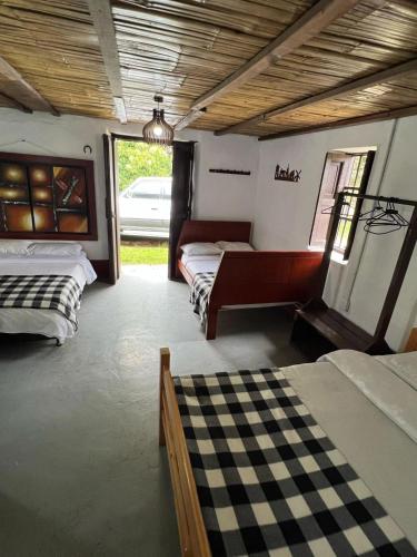 Postel nebo postele na pokoji v ubytování Mi casa amarilla