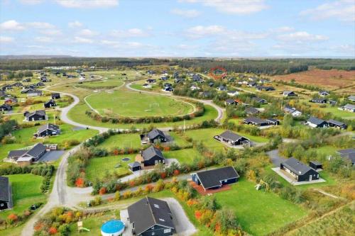 an aerial view of a village with houses and roads at JB178-Brovst-Kronvildtvej-3 in Tranum