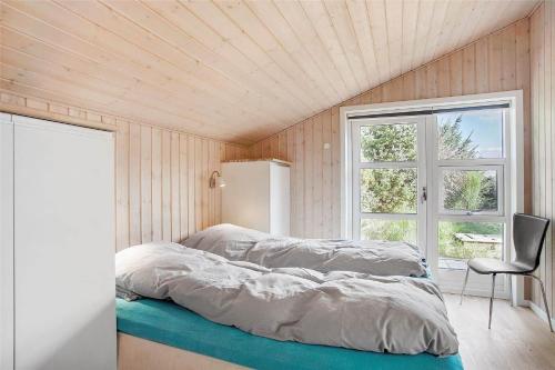 Ένα ή περισσότερα κρεβάτια σε δωμάτιο στο JB133-Fjerritslev-Blabaerstien-35