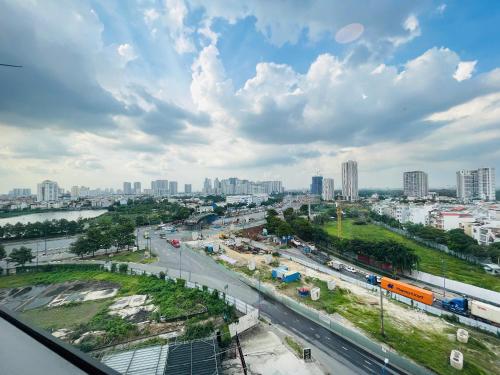 a view of a city with traffic on a highway at The Sun Avenue Apartment Moonlight in Ho Chi Minh City