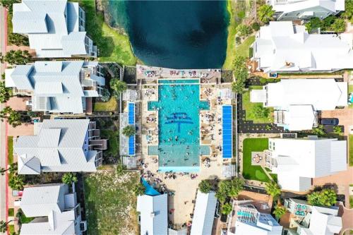 an aerial view of houses and a swimming pool at Coastal Reverie TC 6301 in Mustang Beach