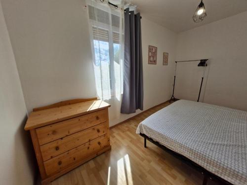 Postel nebo postele na pokoji v ubytování La maison de Victoire avec cour