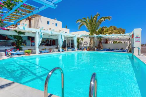 a swimming pool at the hotel at Sigalas Beach Hotel in Kamari