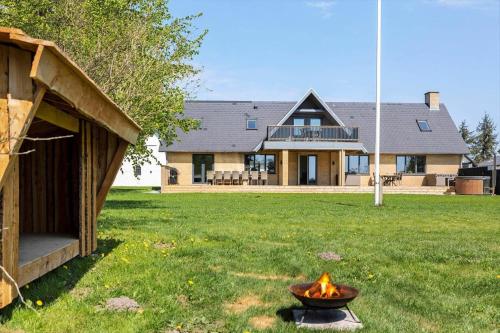 a fire pit in the yard of a house at JB200-Fjerritslev-Udklitvej-168 in Fjerritslev