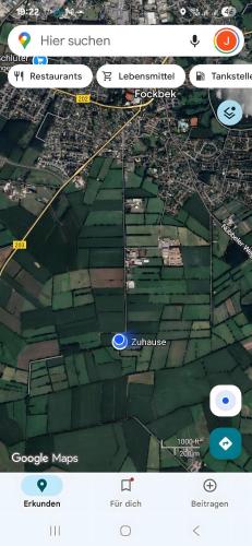 a screenshot of a cell phone screen with a map at Fewo Lütt Stuv in Fockbek
