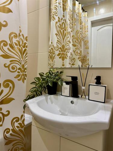 Ένα μπάνιο στο Cozy Šmozy Apartamentai