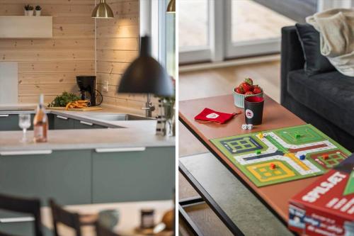 una cucina e un soggiorno con un tavolo di JB350-Fjerritslev-Egevej-9 a Fjerritslev