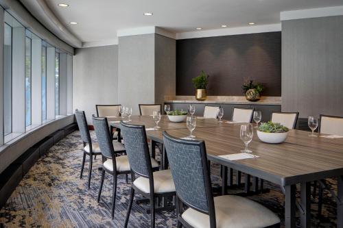 a conference room with a long table and chairs at JW Marriott Grand Rapids in Grand Rapids