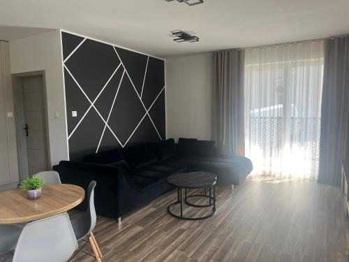 Χώρος καθιστικού στο Duży Apartament 3 pokoje Park City