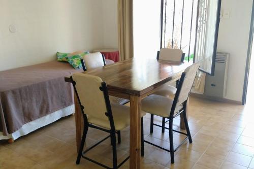 Ένα ή περισσότερα κρεβάτια σε δωμάτιο στο Apart Cabañas La Estancia