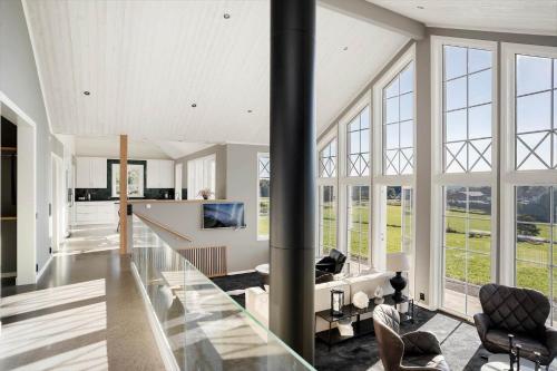 a large living room with large windows at BOH607-Udevalla-Kolvik-254 in Klev