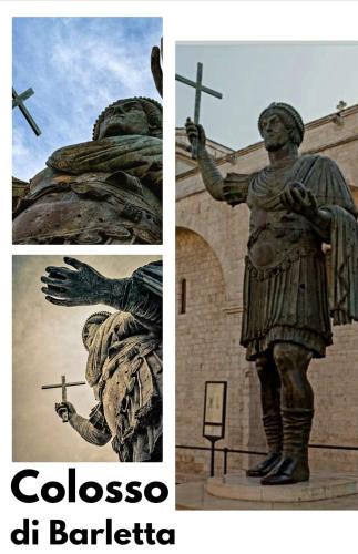 a statue of a man standing in front of a building at Binario1 Rooms in Barletta