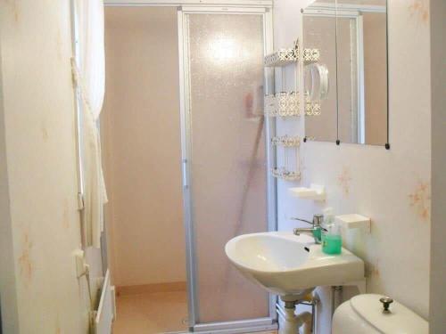 a bathroom with a shower and a sink and a toilet at KRO734-Lidhult-Odensjoe-3 in Odensjö