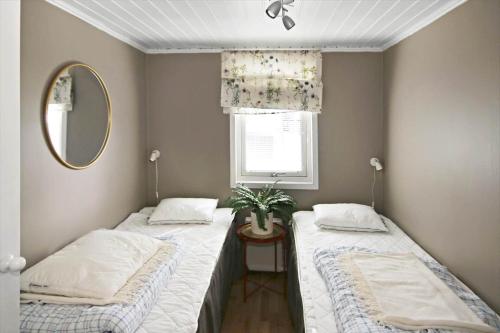 Ένα ή περισσότερα κρεβάτια σε δωμάτιο στο HAL314-Unnaryd-Ropareudden-5