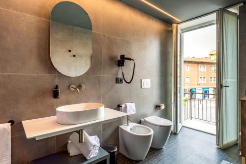 Koupelna v ubytování WEGA Hotel Verona