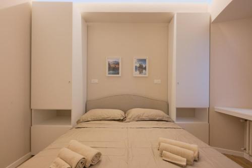 Giường trong phòng chung tại Lynx Retreat 1BR Apartment B