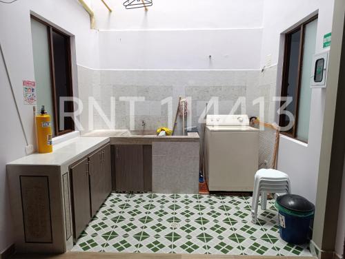 a kitchen with a sink and a counter top at Apartamento Nomadas in Santa Rosa de Cabal