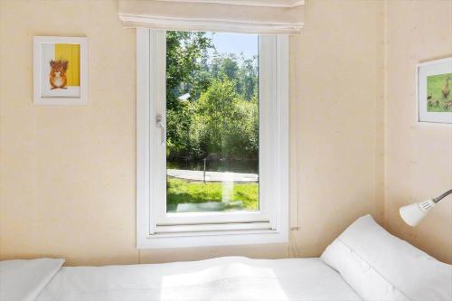 Postel nebo postele na pokoji v ubytování KRO617-Froeseke-Dammgatan-5
