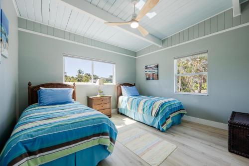 Ένα ή περισσότερα κρεβάτια σε δωμάτιο στο MangoesDuplex