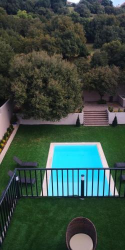 an overhead view of a swimming pool in a yard at Villa27 in Amman