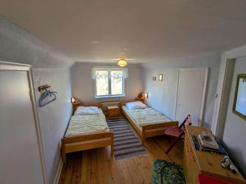 Postel nebo postele na pokoji v ubytování KAL682-Silverdalen-Hultasavaegen-2